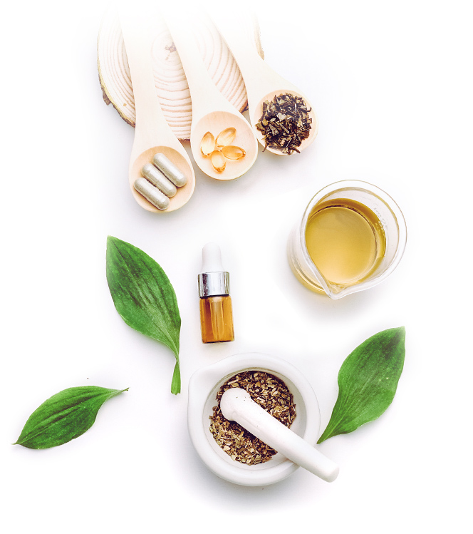leaves, oils and pills representing alternative and conventional medicine